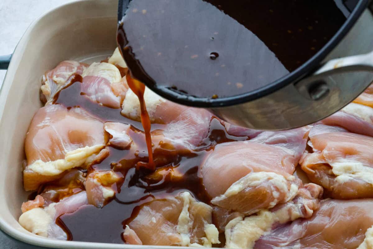 Third photo of the sauce pouring over the chicken.