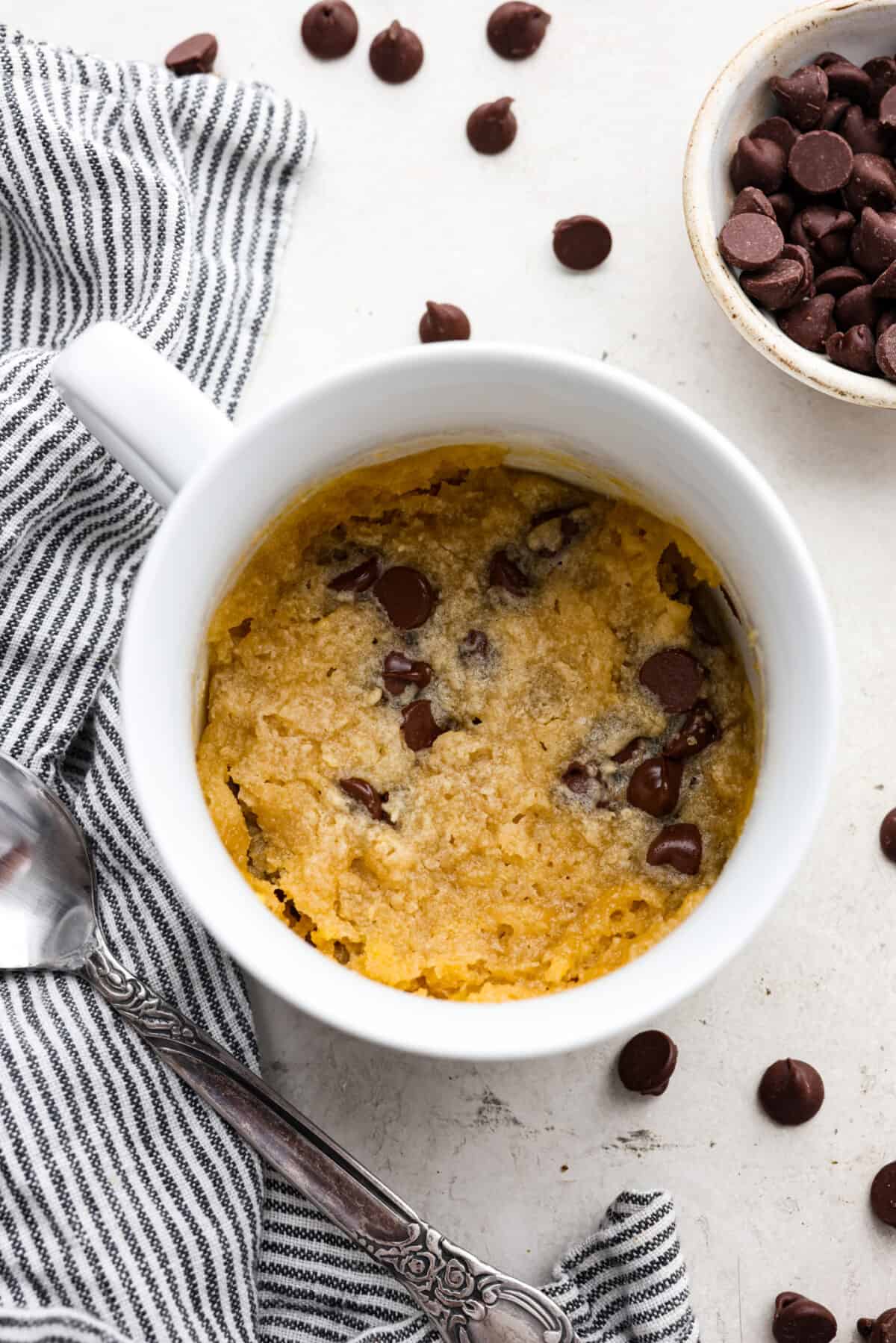 Overhead shot of cooked cookie in a mug. 