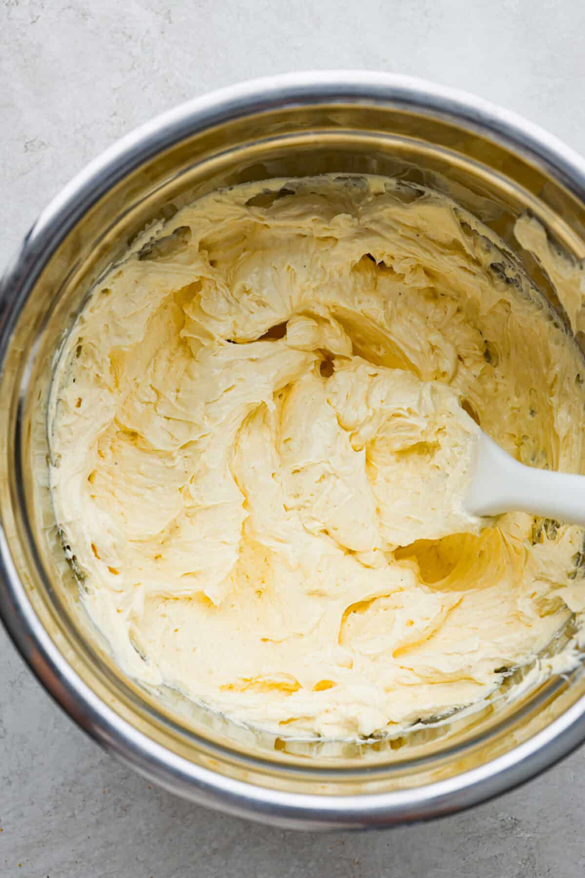 Overhead shot of french buttercream in a bowl. 