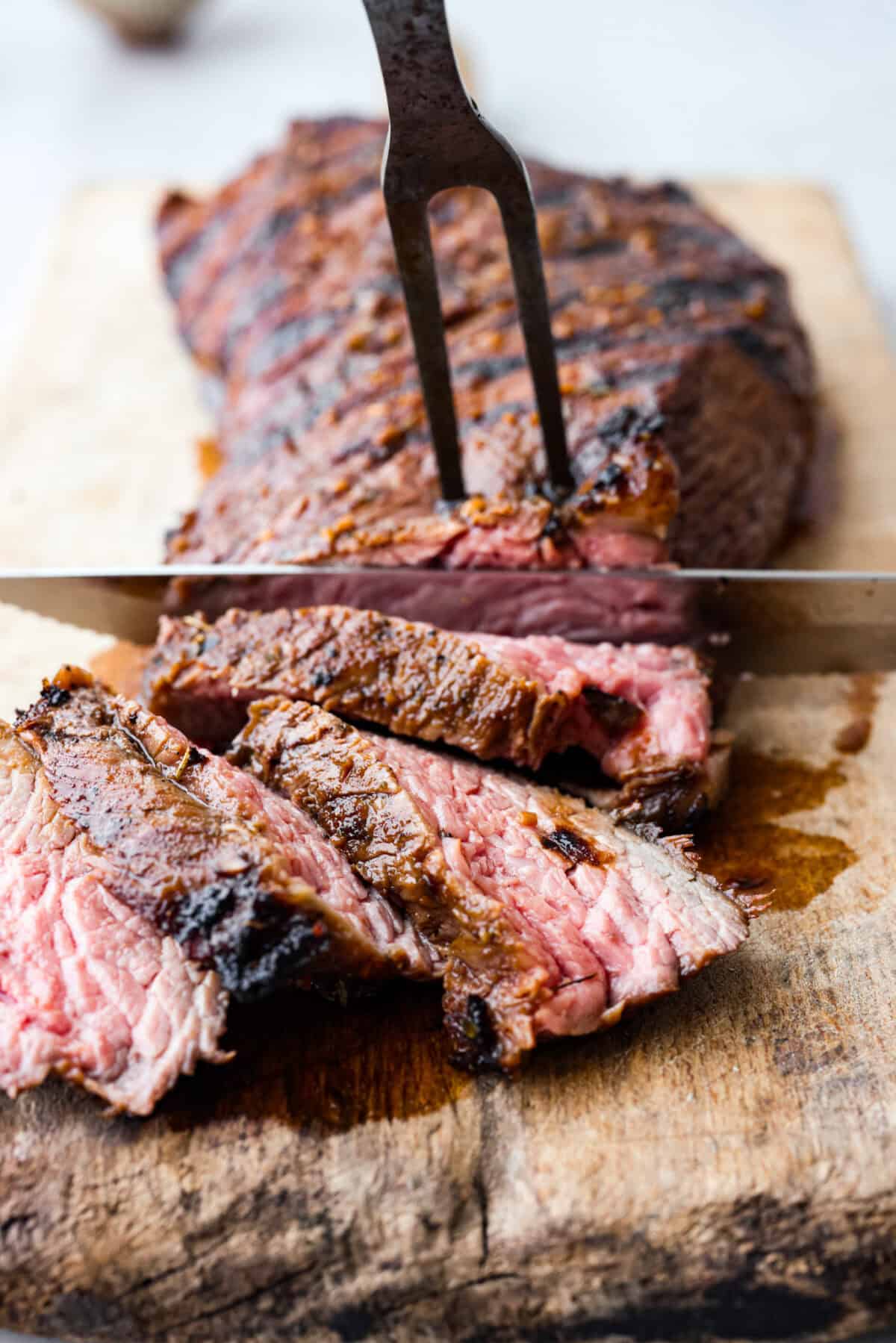 Close up shot of slicing the meat. 