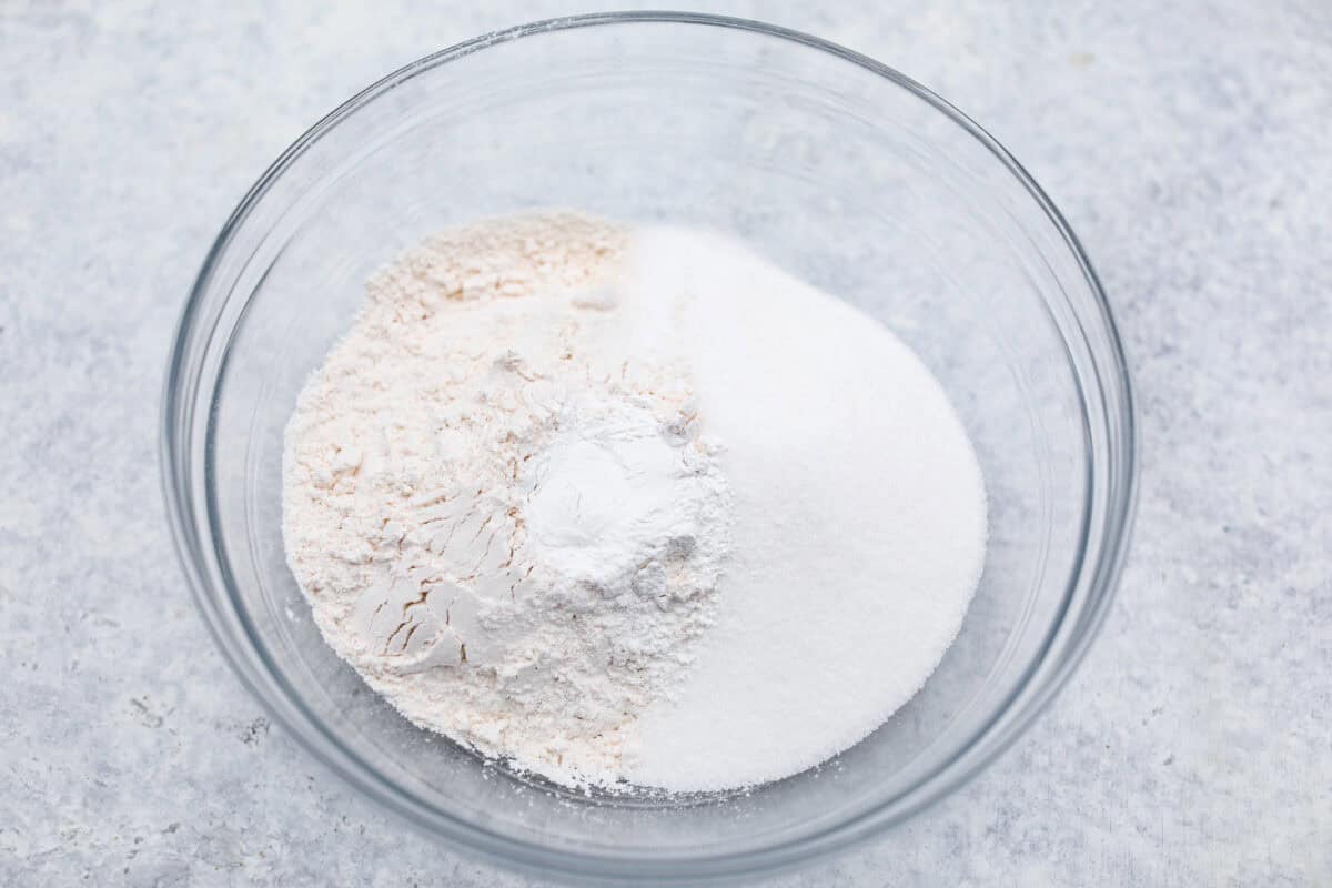 Overhead shot of dry ingredients in a glass bowl. 