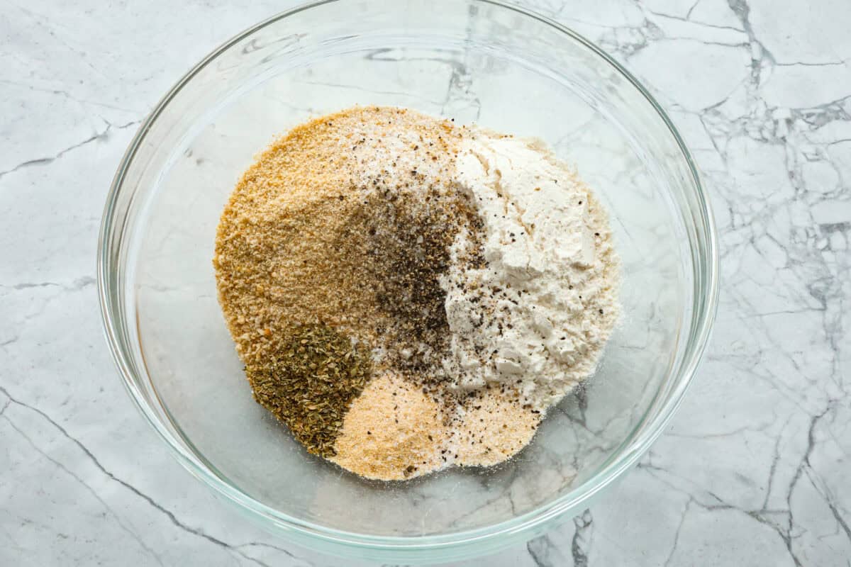 Overhead shot of breading ingredients in a bowl. 