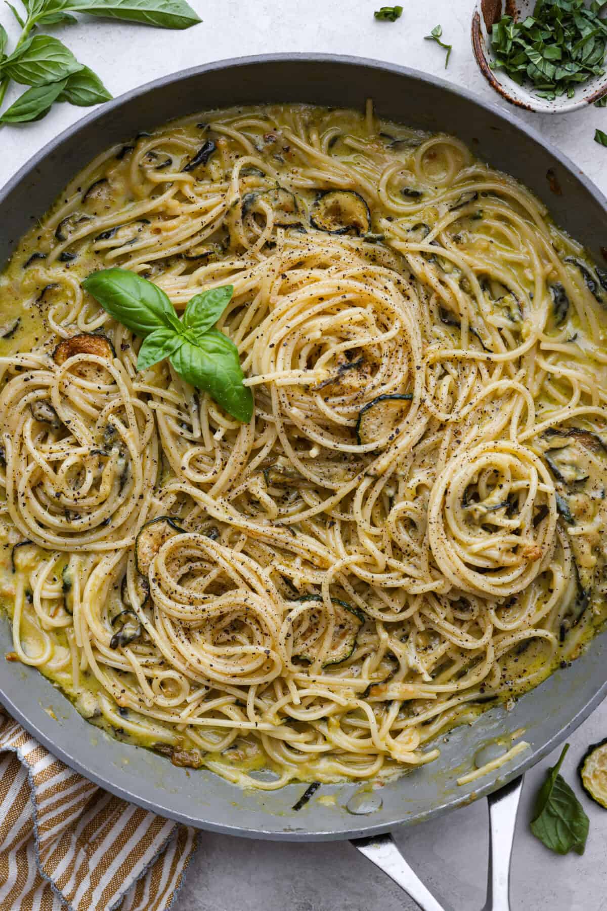 Top view of the spaghetti alla Nerano in a skillet.