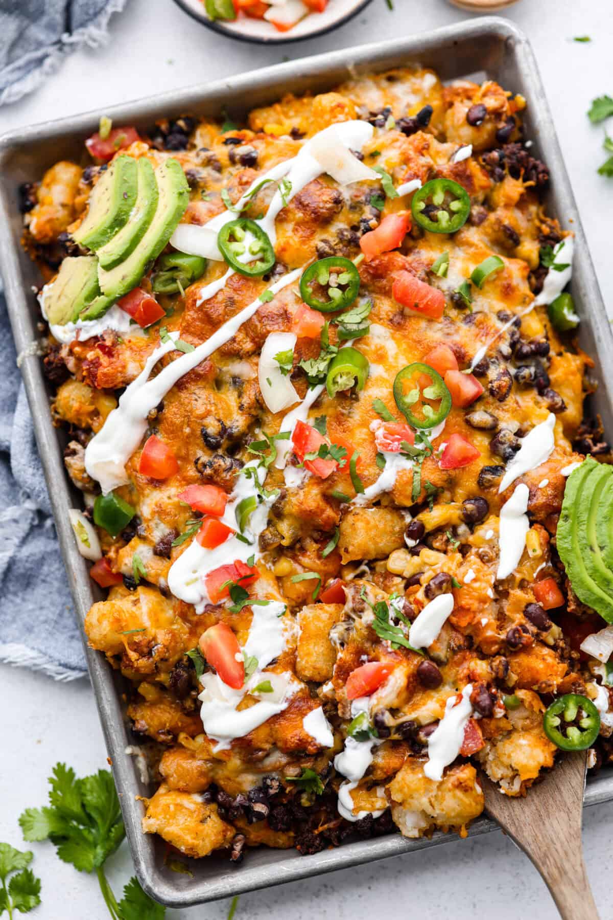 Overhead shot of pan of tater tot nachos. 