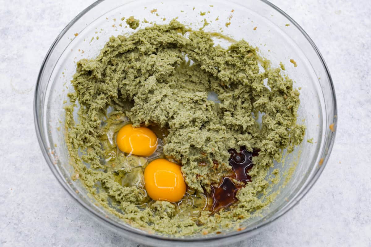 Overhead shot of the butter, sugar and pudding mixture with eggs and extracts. 