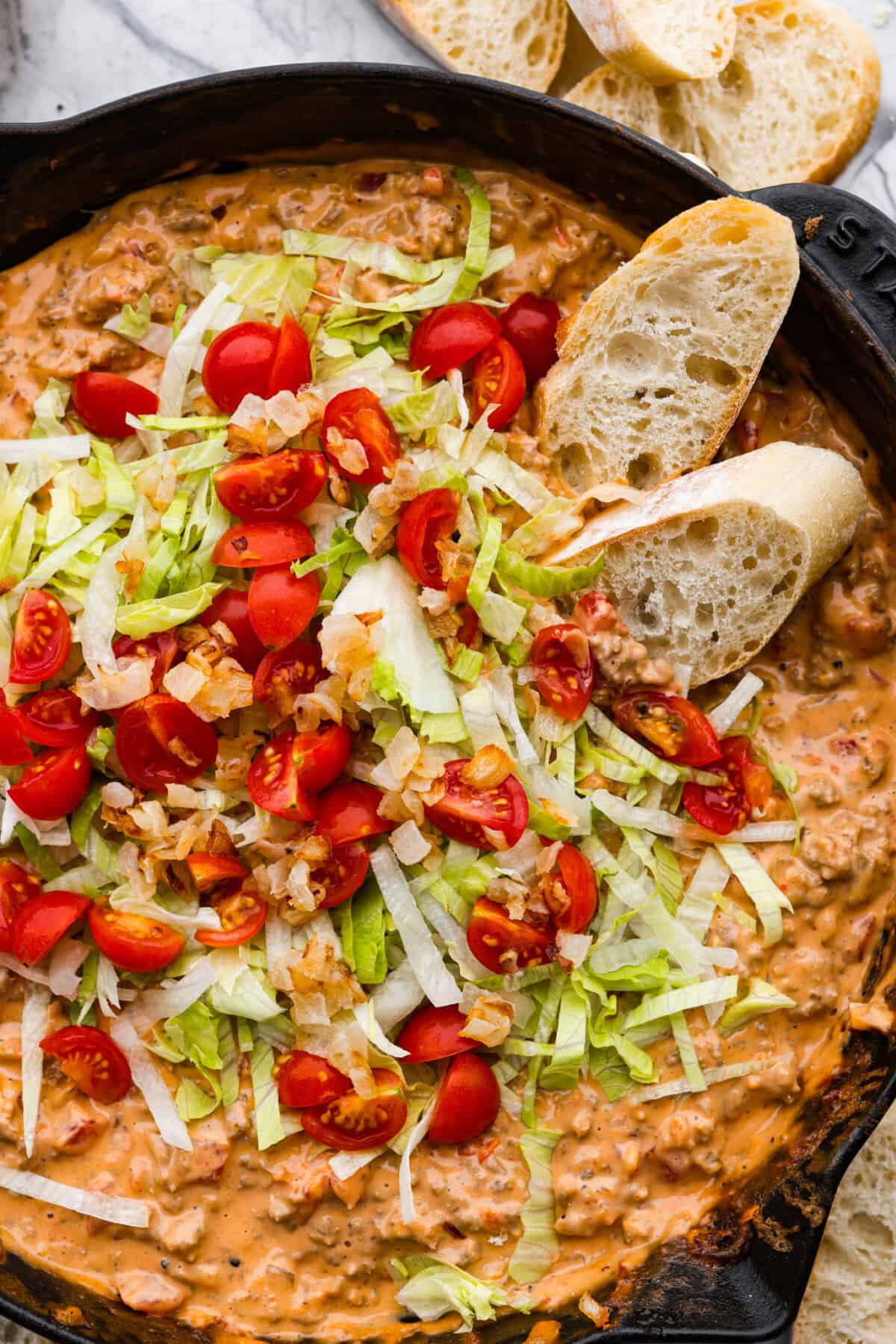 Close up shot of cheeseburger dip.