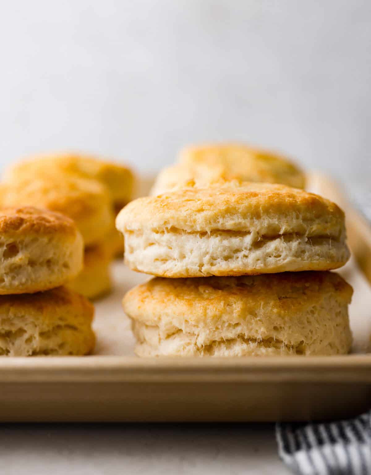 Close up shot of stacked cream cheese biscuits. 