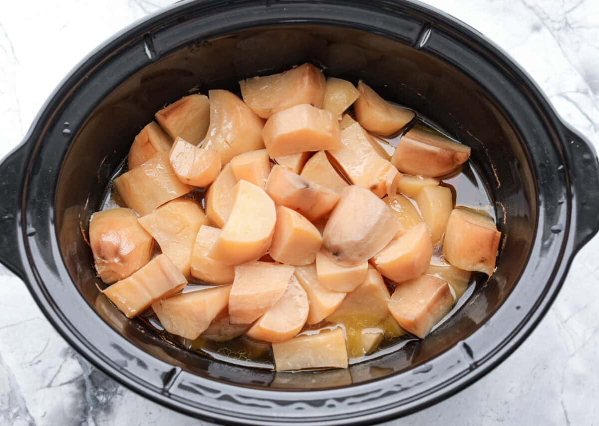 Overhead shot of cooked potatoes in crockpot.