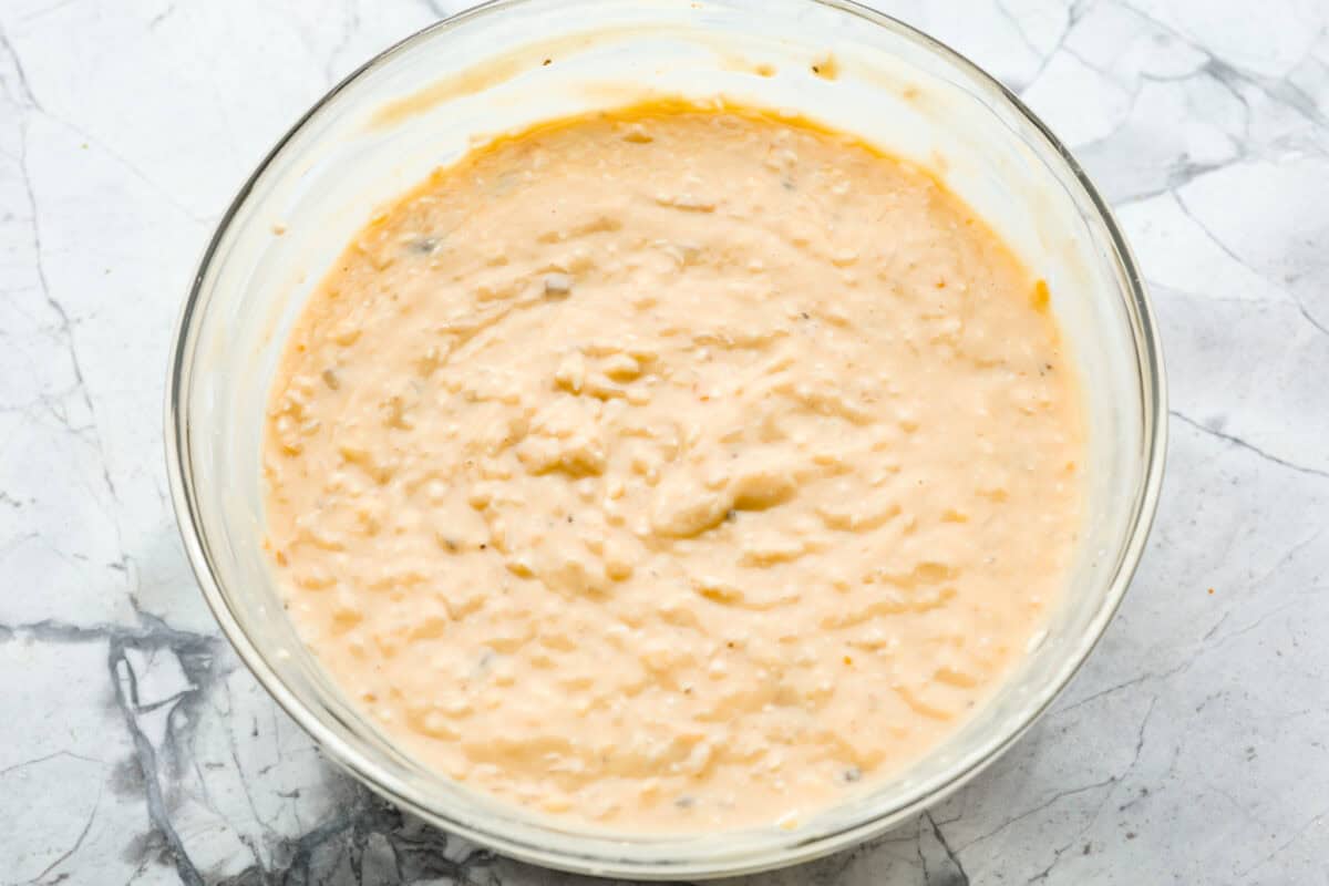 Overhead shot of rice and soup mixture mixed together.