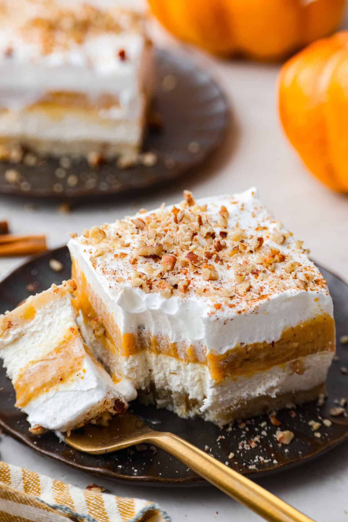 Close view of a bite of pumpkin delight on a fork.