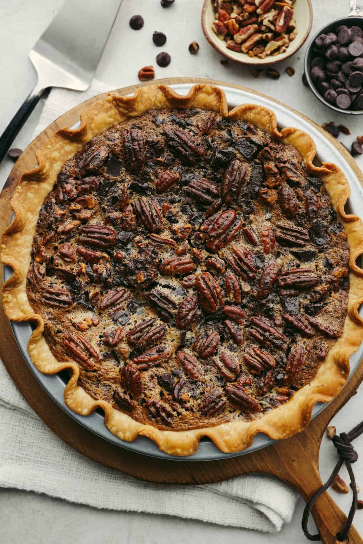 Overhead shot of baked chocolate pecan pie. 