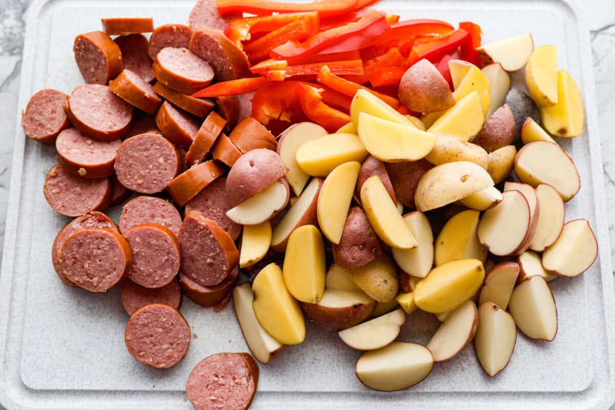 First photo of the sausage, potatoes, and peppers cut.