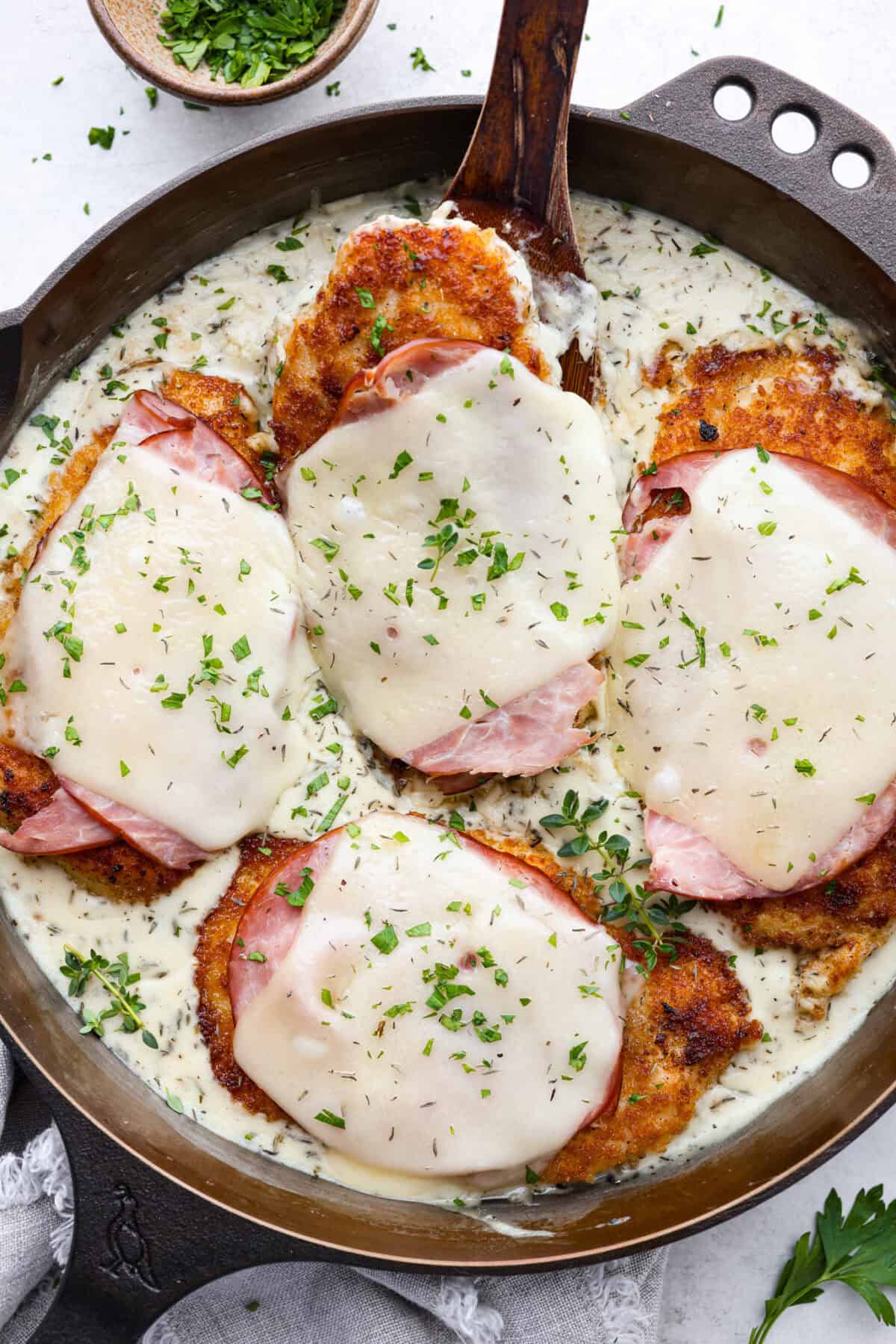 Overhead shot of skillet chicken cordon bleu. 