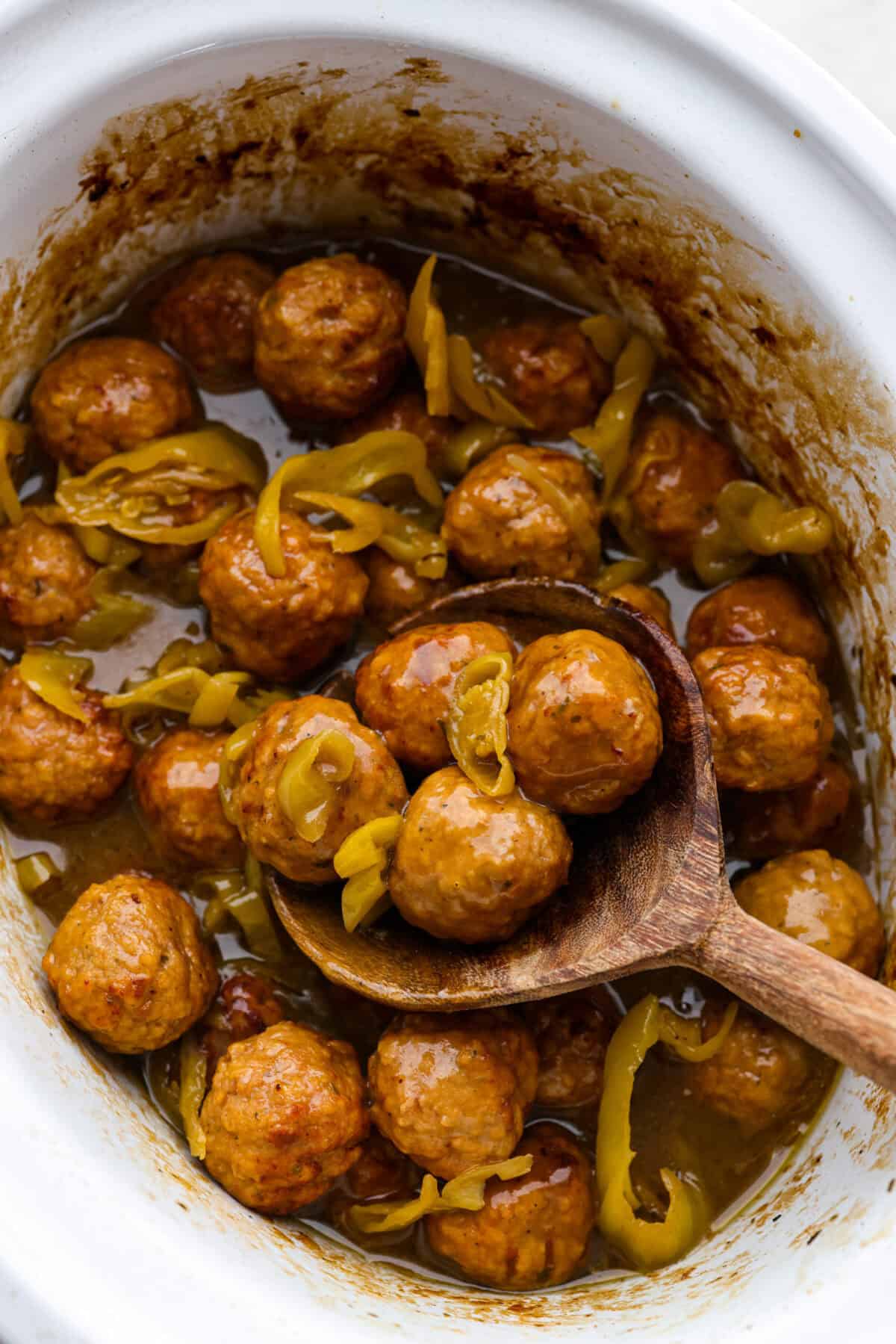 Overhead shot of crockpot Mississippi meatballs . 