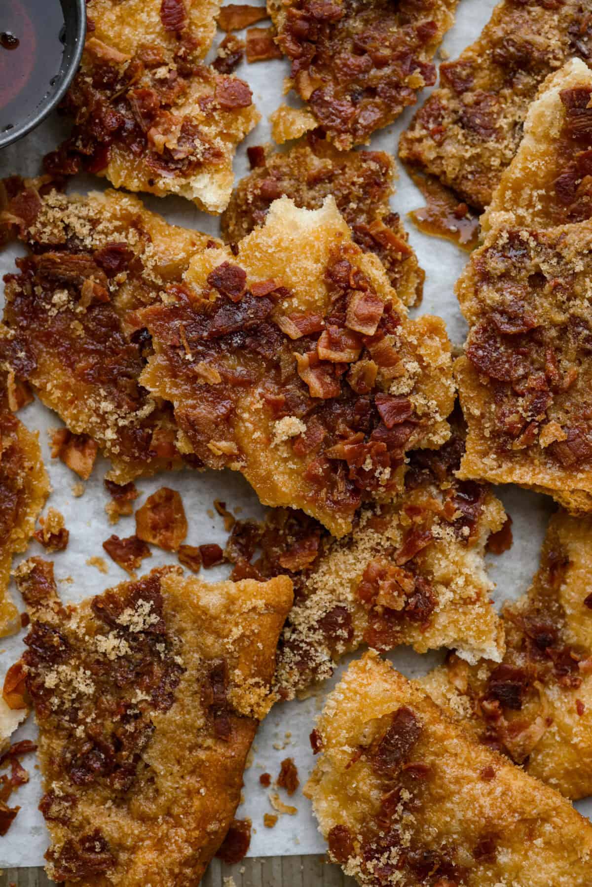 Close up shot of broken up pieces of maple bacon crack. 