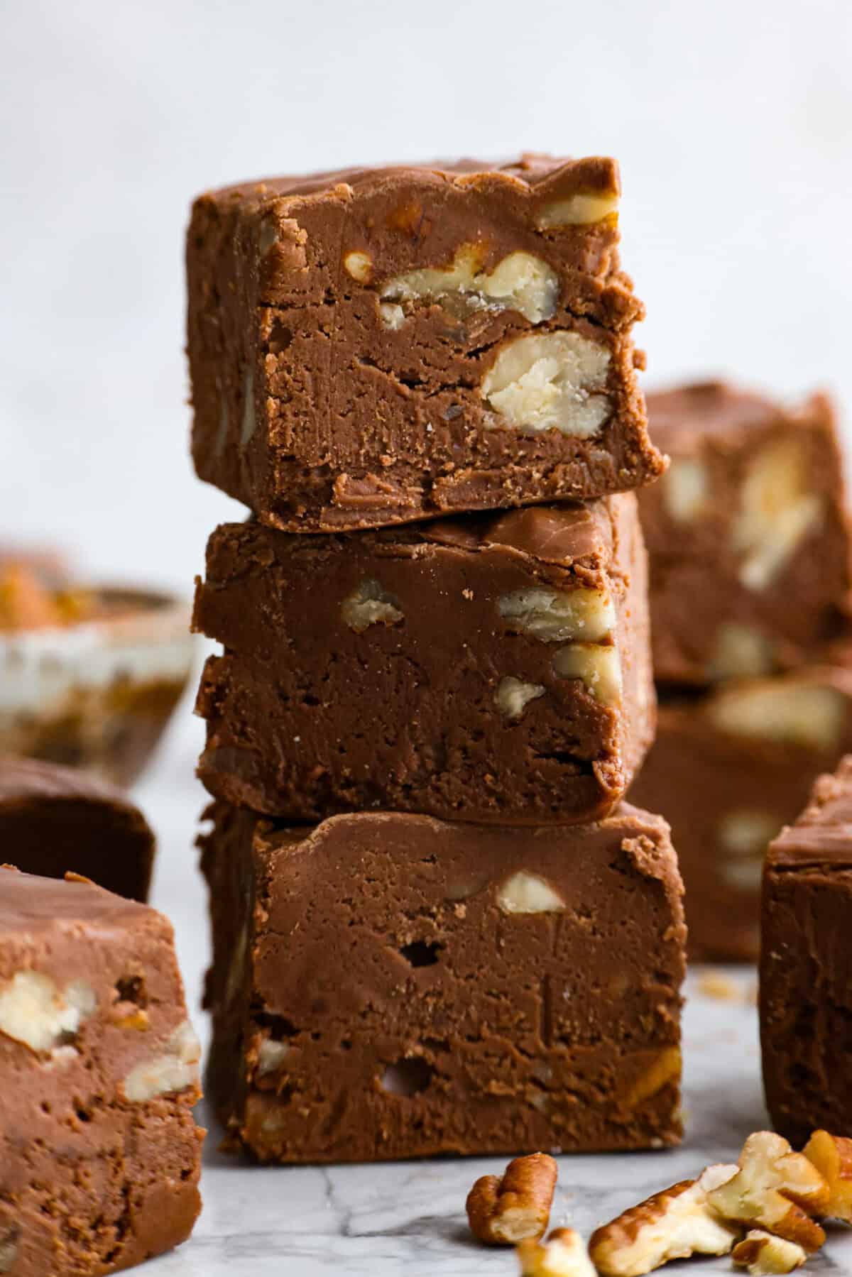 Side shot of stacked pieces of million dollar fudge.