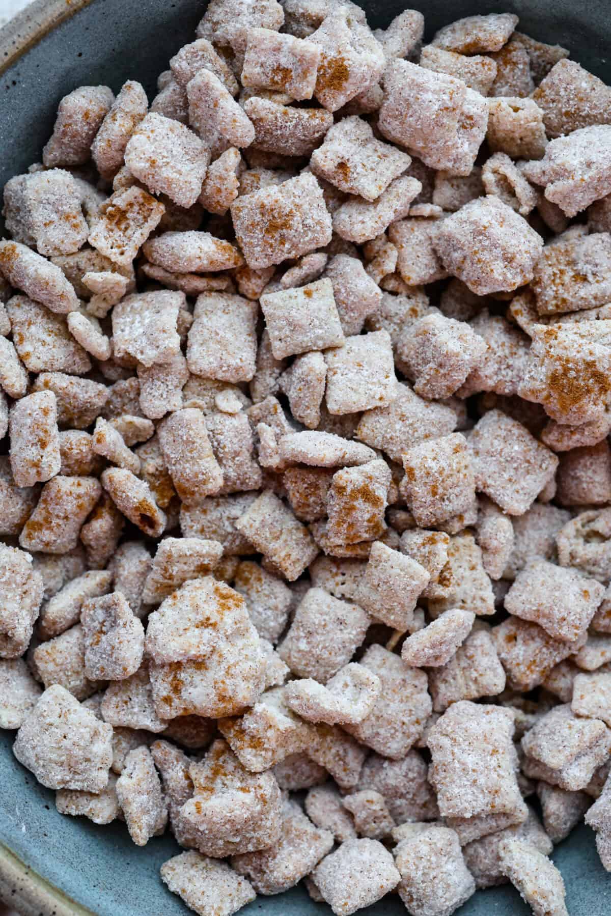 Close up shot of churro Chex mix. 