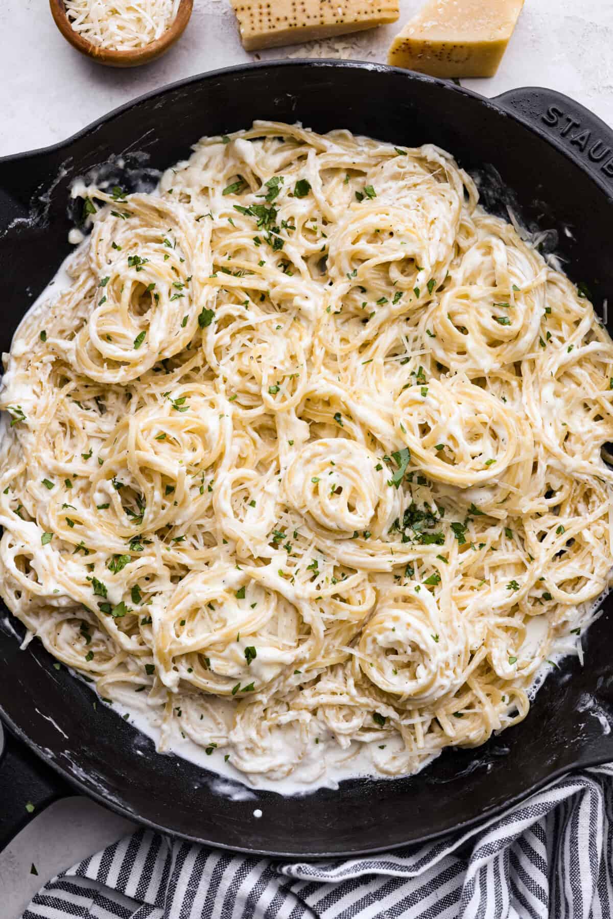 Overhead shot of creamy parmesan pasta roni in a skillet. 