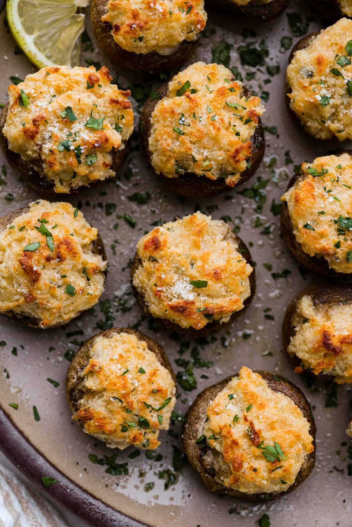 Close up shot of crab stuffed mushrooms. 