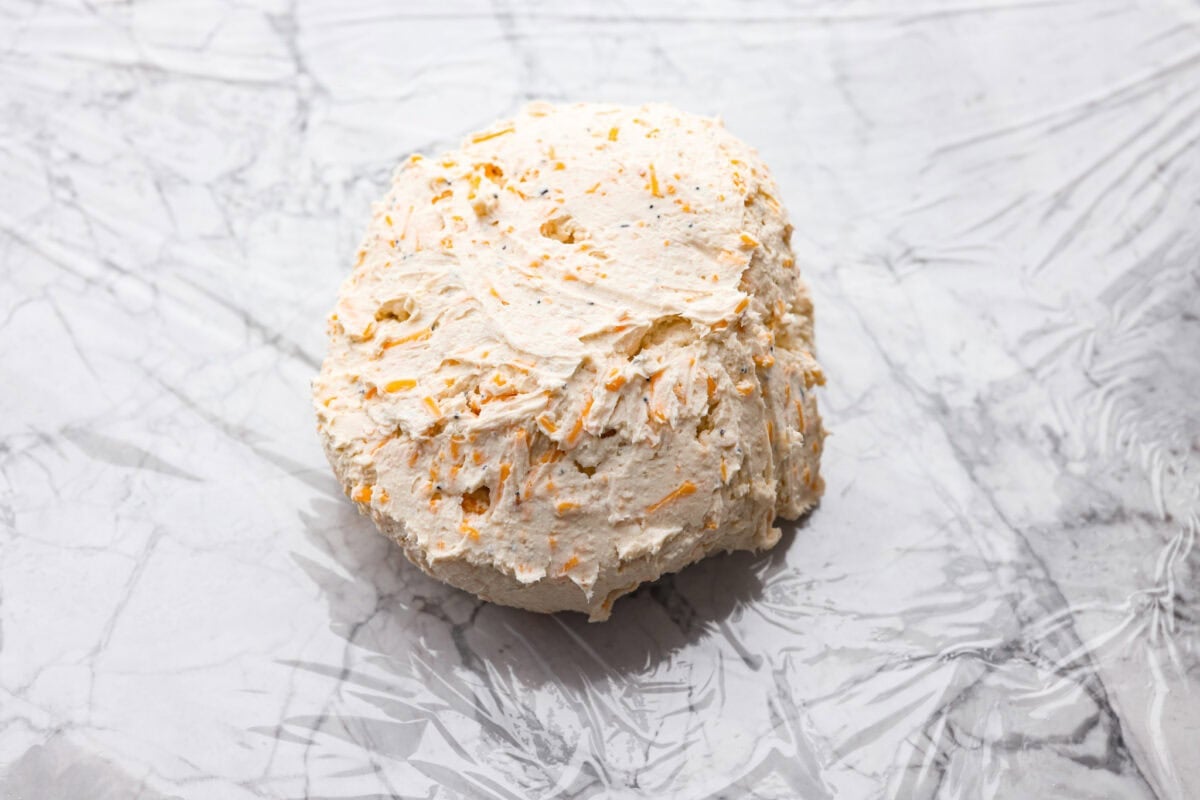 Overhead shot of the cheeseball formed into a ball. 